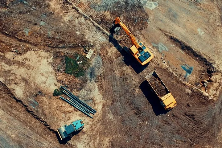 Aerial view of earthmoving machinery at a construction site